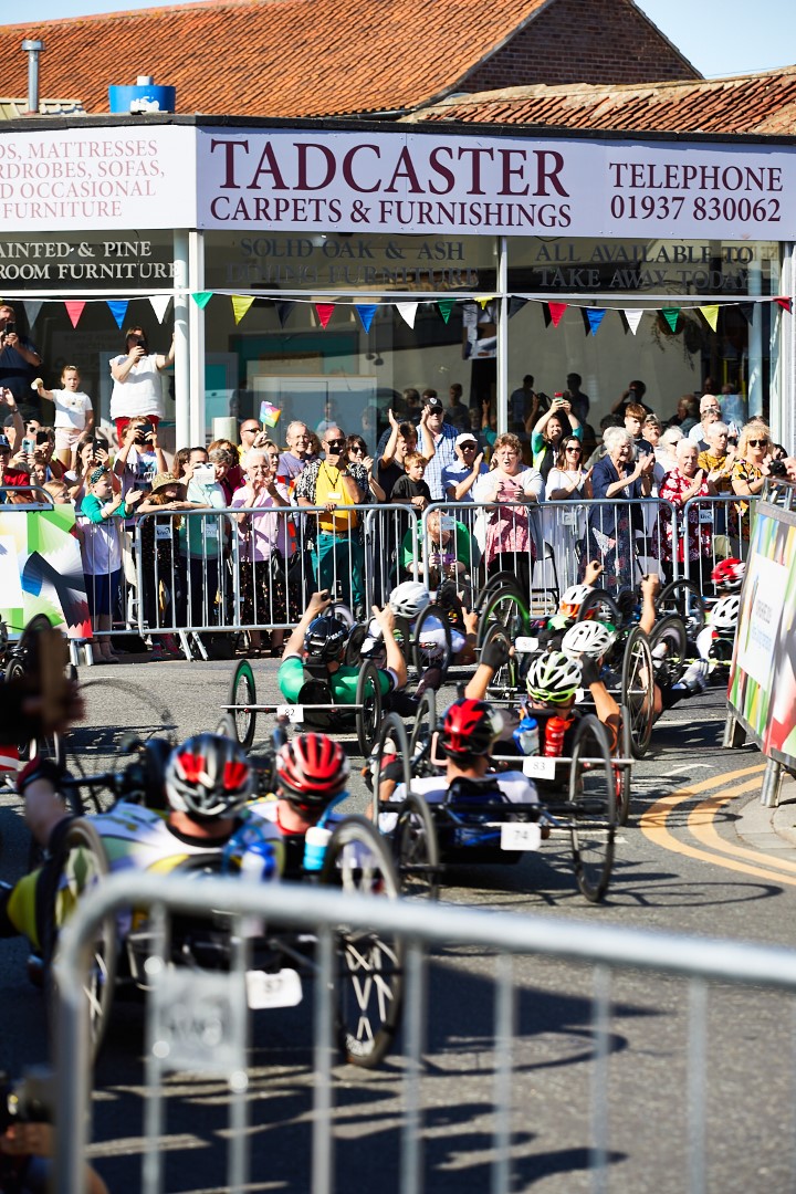 cyclists round a corner